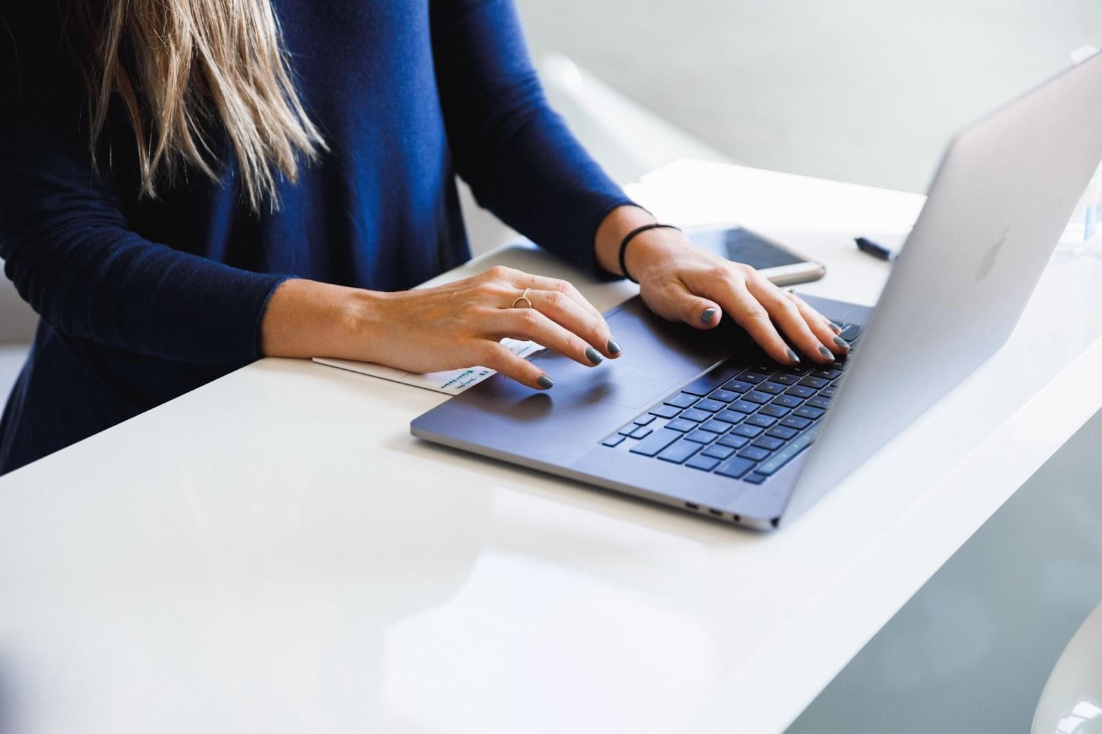 Woman using laptop computer